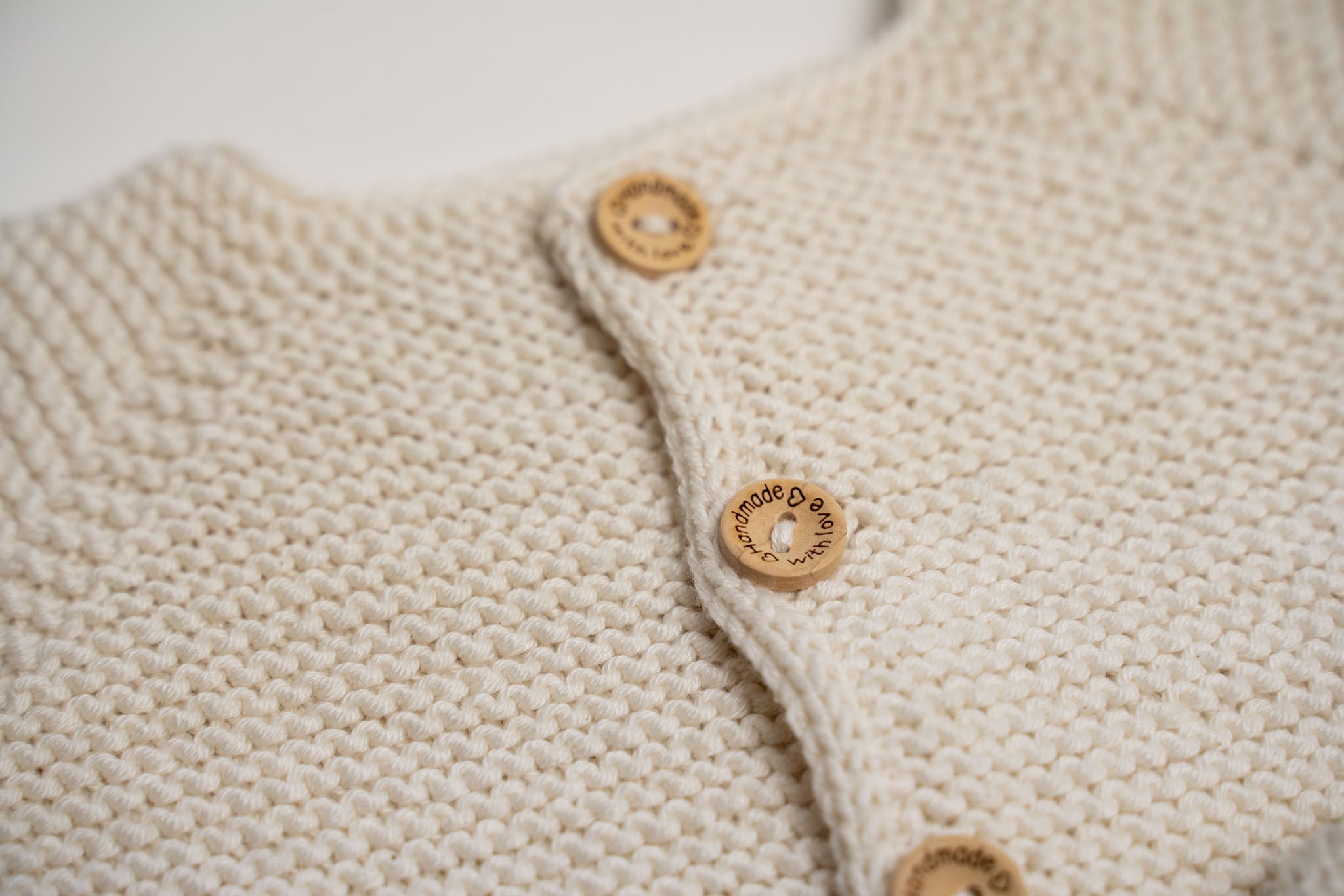 Knit Blue Rabbit Cardigan with Blue Rabbit Rattle